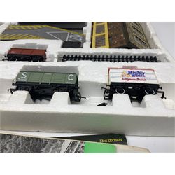 Hornby '00' gauge - Midnight Freight electric train set with Class 58 diesel Co-Co locomotive No.58001, eight wagons, goods shed, track, car loading ramp and power controller etc; boxed with paperwork; together with an additional wagon, figures and platform fencing