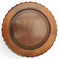 Pair of early 20th century Oriental hardwood barrel seats, of drum form with shaped apron and pierced panels, carved with stylised scrollwork and studded detail to the top