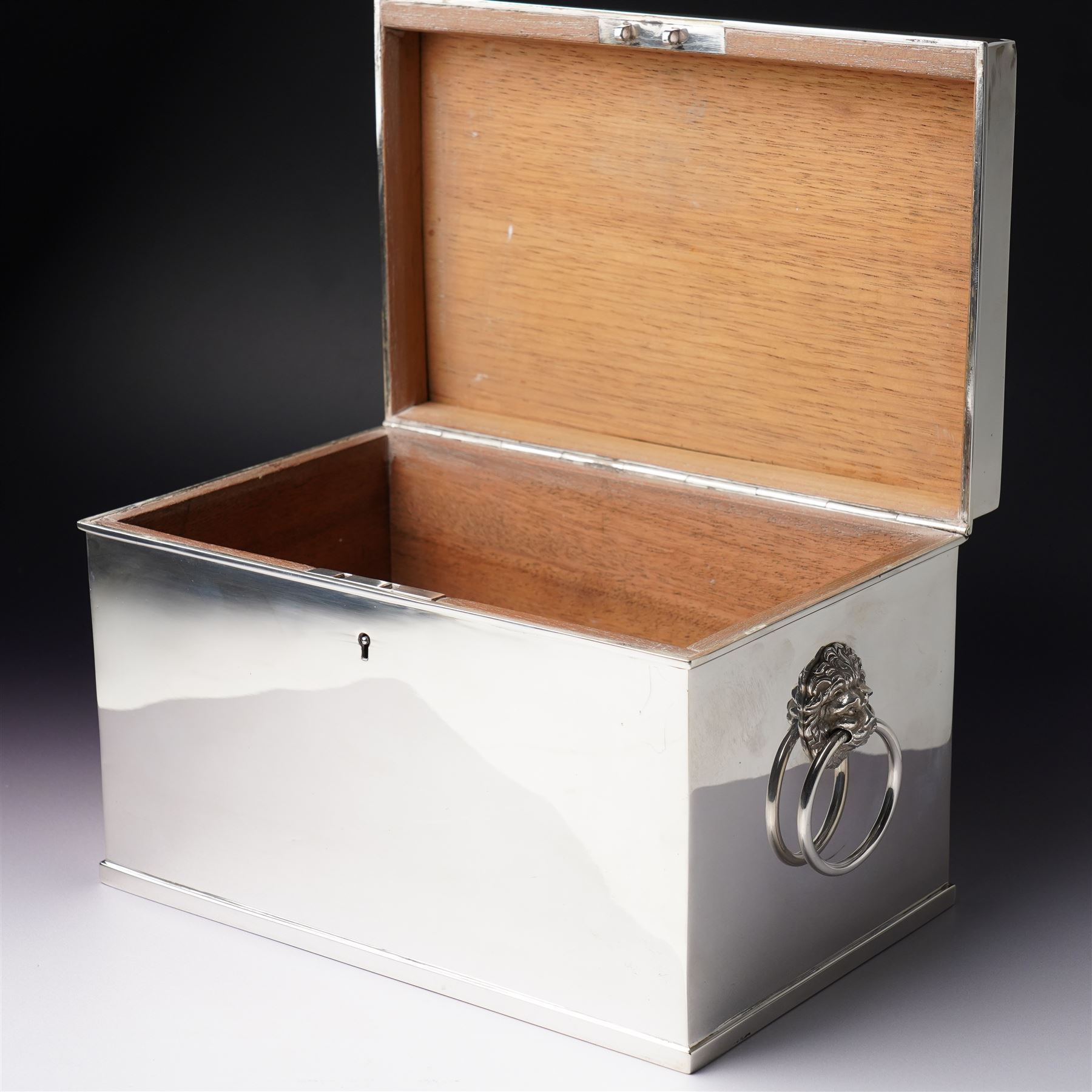 Edwardian silver rectangular cigar box with lion mask ring handles and wooden lined interior 24cm x 15cm x 15cm Birmingham 1909 Maker Horton & Allday 