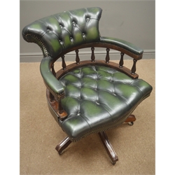  Leather swivel desk chair, upholstered in a dark green leather, deeply buttoned, five splayed supports  