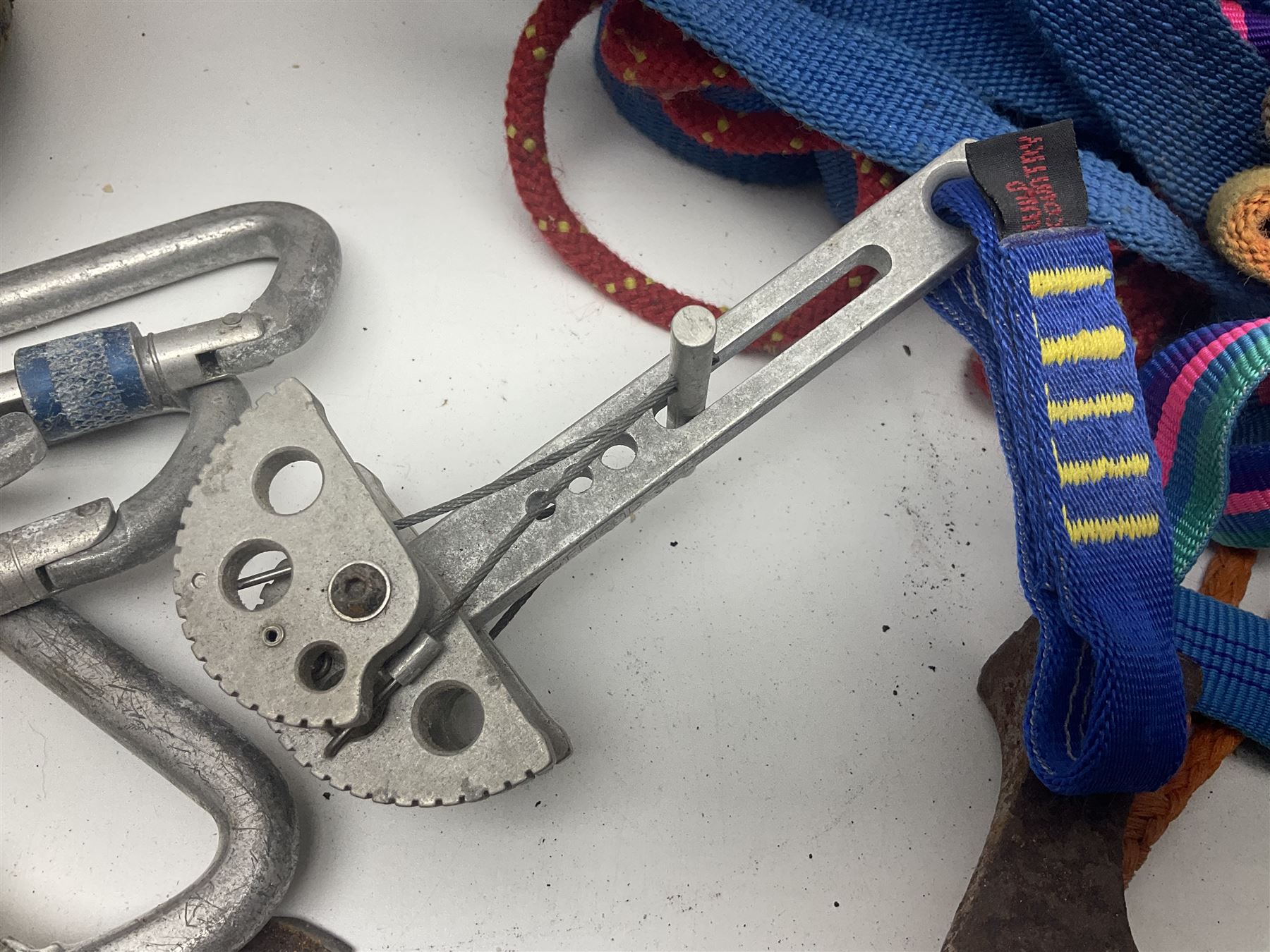 Collection of 1960s/70s climbing equipment including two original Hamish McInnes Pterodactyl ice axes, Joe Brown helmet, carabiners, ropes and wires etc