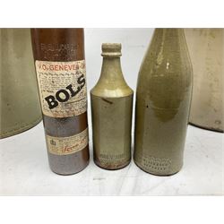 Large 19th century stoneware flagon with loop handle and tapering body, together with three stoneware jars, two stoneware bottles impressed Beverley and a BOLS V.O. Genever Gin bottle, largest H47.5cm