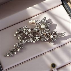 19th century gold and silver diamond and pearl en tremblant detachable brooch, the flower tremblant with a principal old cut diamond of approx 1.90 carat, the petals and stamen set with old cut and rose cut diamonds, total diamond weight approx 9.10 carat, to a foliate spray set set with further rose cut diamond and white / pink / cream pearls and ribbon tie