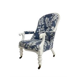 Victorian white painted open armchair, upholstered in blue fabric decorated with trailing leaf pattern, scrolled arm terminals on turned front supports with castors