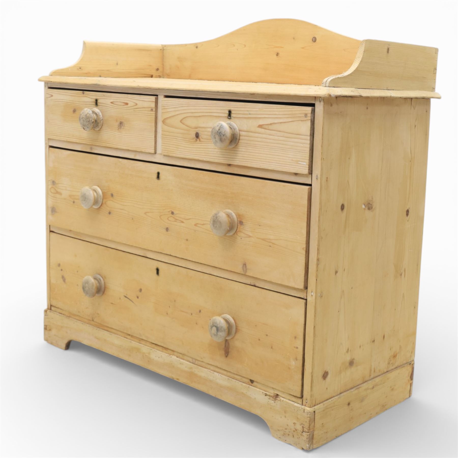 20th century pine chest of drawers, shaped galleried top, above two short over two long drawers, raised on bracket feet