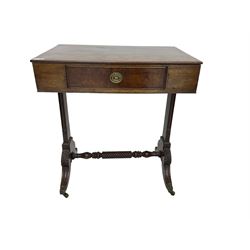 19th century mahogany side table, rectangular top fitted with single drawer, on tapered end supports joined by rope twist stretcher, on acanthus carved splayed supports with brass cups and castors