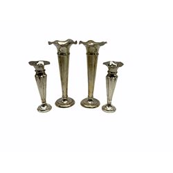 Four piece matched silver mounted cut glass dressing table set, the covers with engraved monogram and two pair of silver trumpet specimen vases, all hallmarked