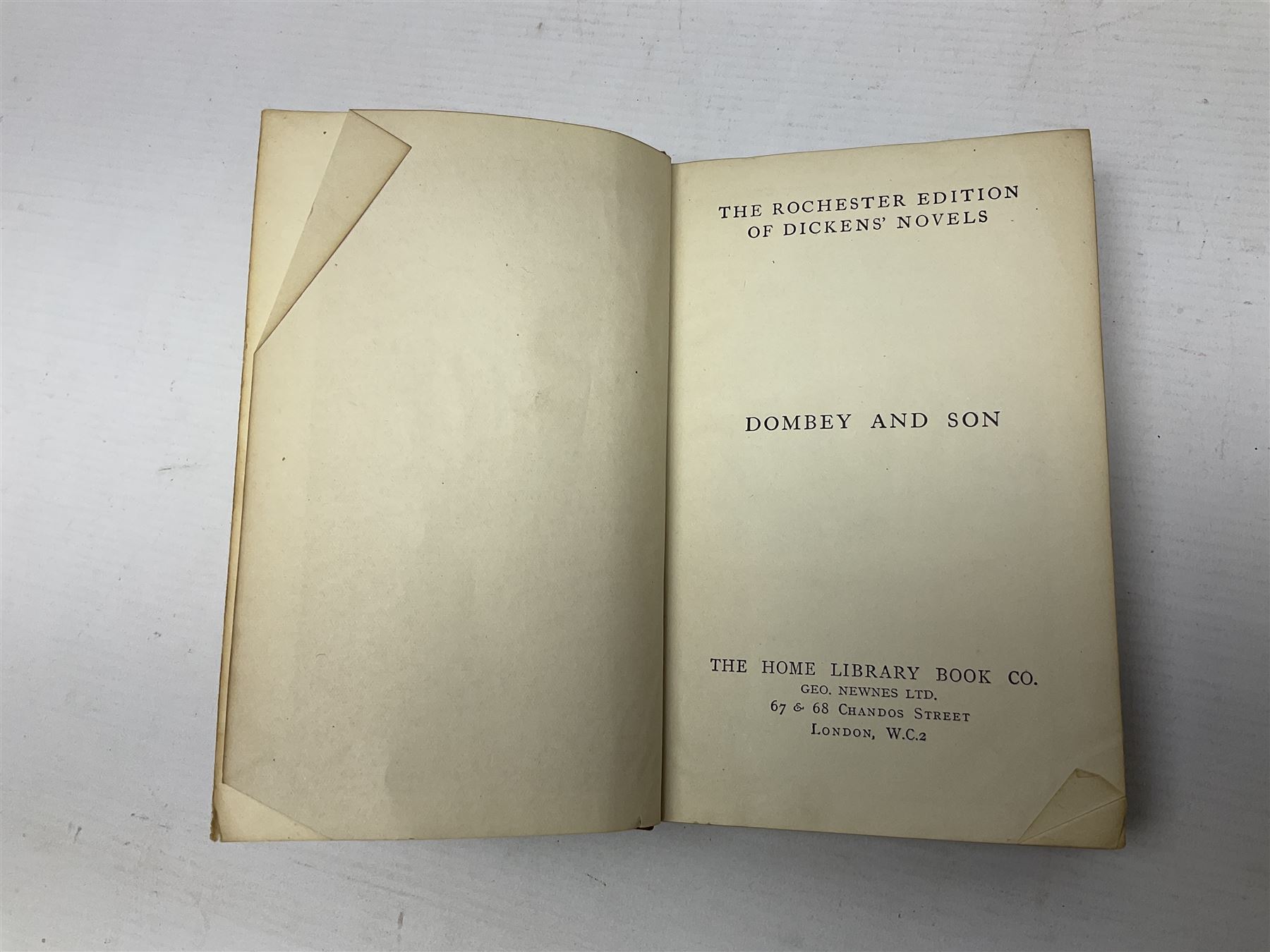 Twenty one volumes of Charles Dickens,  by The Home Library Book company, together with The Readers Digest bedside book of the art of living 