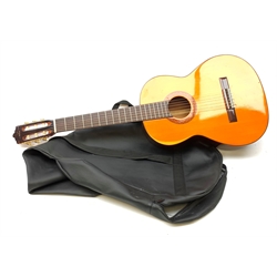 A Marina acoustic guitar, L100cm in fabric carry case.