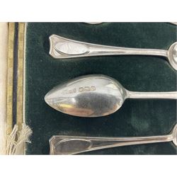 Set of six 1920s silver spoons, hallmarked, together with a set of six silver plated piston grip handled butter knives, both within fitted cases