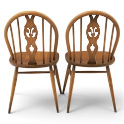 Ercol - Set of four dark elm 'Fleur De Lys' chairs