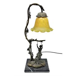 Art Nouveau style lamp in the form of a woman on a swing, with a green mottled shade, upon a marble base H52cm