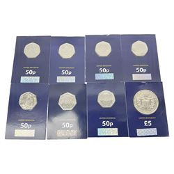 Queen Elizabeth II United Kingdom commemorative coins, including seven fifty pence coins and 2017 'Century of The House of Windsor' five pound coin, each housed on Change Checker card
