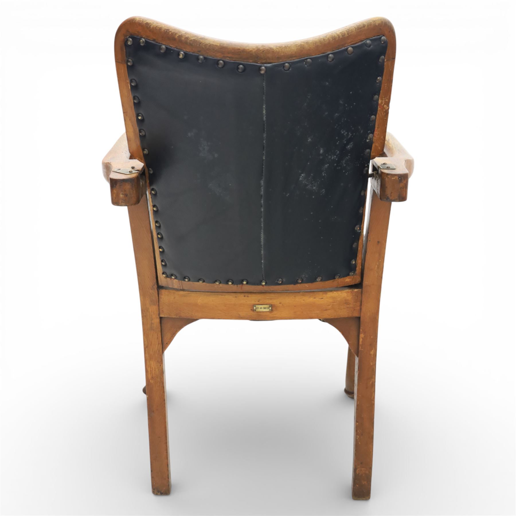 20th century oak recliner armchair, the curved back upholstered in leather with brass stud edging, hinged reclining back operated by side ratchet fittings, leather upholstered seat, shaped open arms, raised on cabriole legs