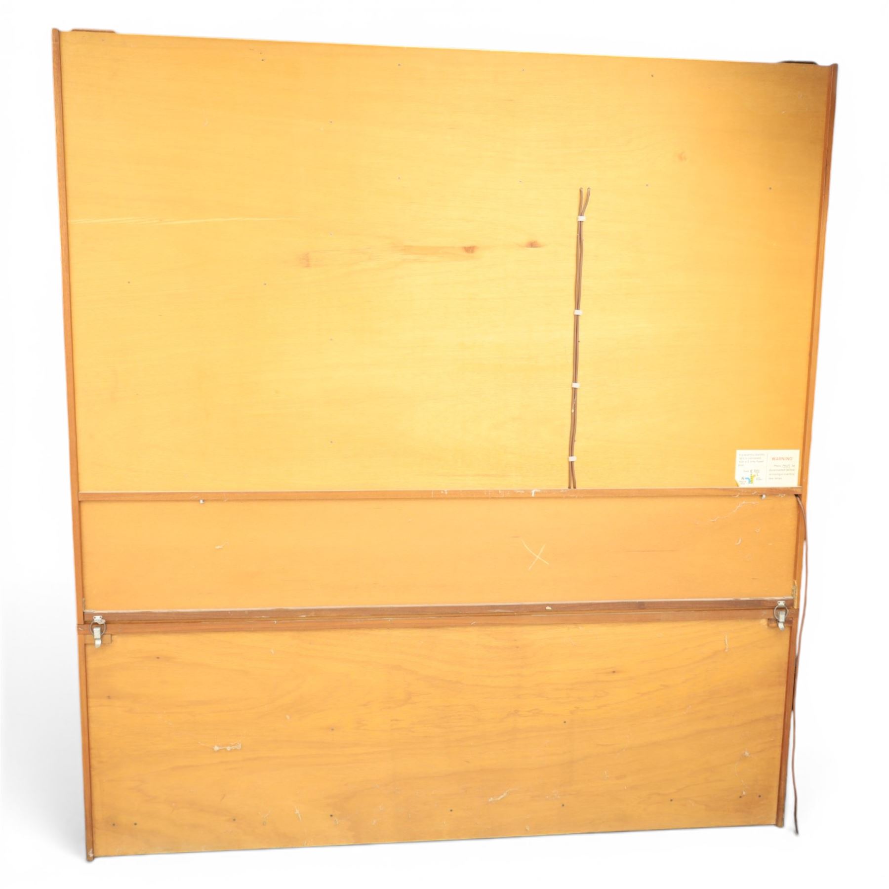 Mid-20th century teak wall display unit, featuring two glazed cupboards and fall front compartment with open shelves, above three drawers and cupboards to the base