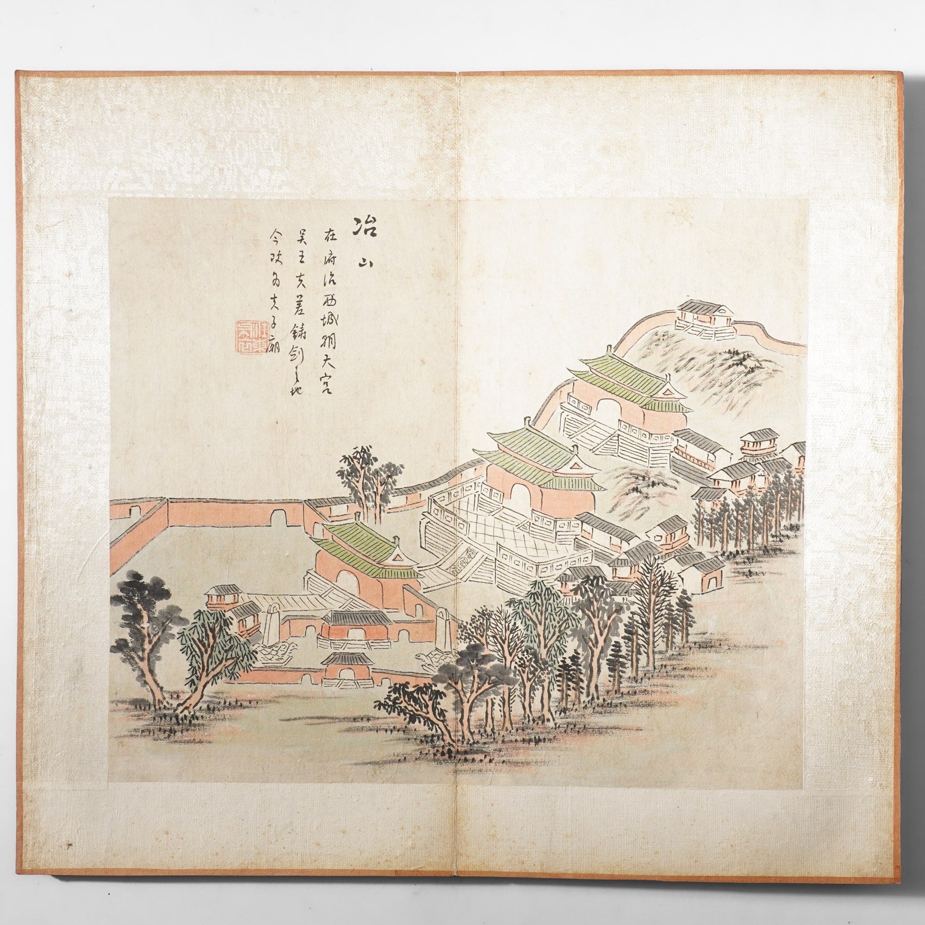 Chinese fold out book, comprising 12 hand-coloured woodblock landscapes each bearing inscription and artists seal  