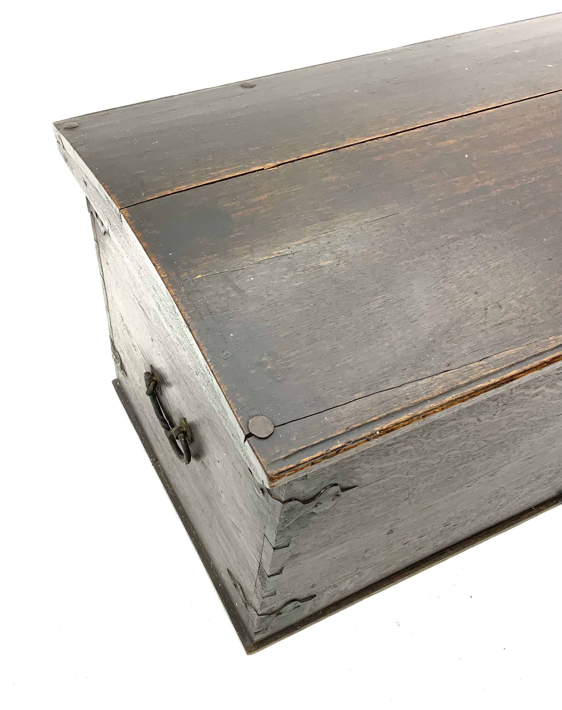 18th century large oak domed trunk, hinge lid enclosing interior, fitted with cast iron handles and joints 