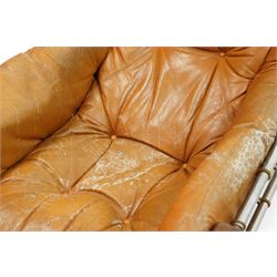 Jean Gillon (Romanian/Brazilian 1919-2007): 'Amazonas' easy chair, mahogany framed with slung leather upholstered cushions, together with matching footstool