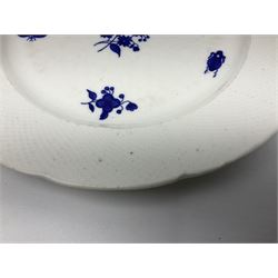 Three 19th century plates, comprising two circular examples and one oblong, each with osier moulded sides, the centres decorated in underglaze blue with Gillyflower type pattern, circular examples D25cm oblong example W27cm