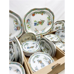 A matched Copeland Spode dinner service, decorated in a chinoiserie style pattern, to include eighteen dinner plates, seven dessert plates, fourteen soup bowls, four tureens (one lacking cover), ten assorted serving platters, jug, etc. 