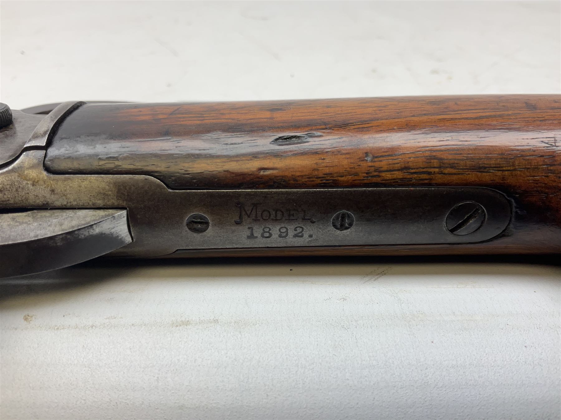 Marlin Firearms Co. USA 'Safety' .32 rim-fire rifle dated 1892, the 61cm barrel with magazine tube under, walnut stock with under lever cocking and crescent butt plate, serial no.153534, L103.5cm
