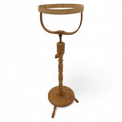 Mahogany torchiere H103cm, pine hat makers' stand H102cm, H91cm brass-bound planter on stand, brass standard lamp stand H127cm (4)