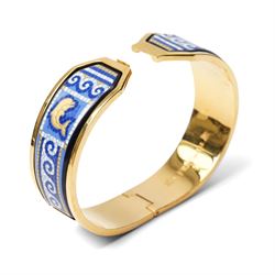 Frey Wille gold plated and enamel suite of jewellery from the Dolphins of Poseidon collection, including a pair of hoop earrings, hinged bangle and pendant on snake chain necklace, all boxed