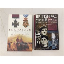 Nine reference books of Victoria Cross interest including four 'VCs of the First World War' series; Martin Ashcroft: Victoria Cross Heroes; John Laffin: British VCs of World War Two; Bryan Perrett: For Valour; Ann Clayton: Martin Leake Double VC; and John Percival: For Valour (9)