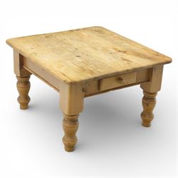 20th century stripped pine coffee table, square top over two frieze drawers, raised on blo...