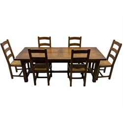 Antix French oak dining table with two leaves, two frieze drawers;, and six ladder back chairs with rush seats