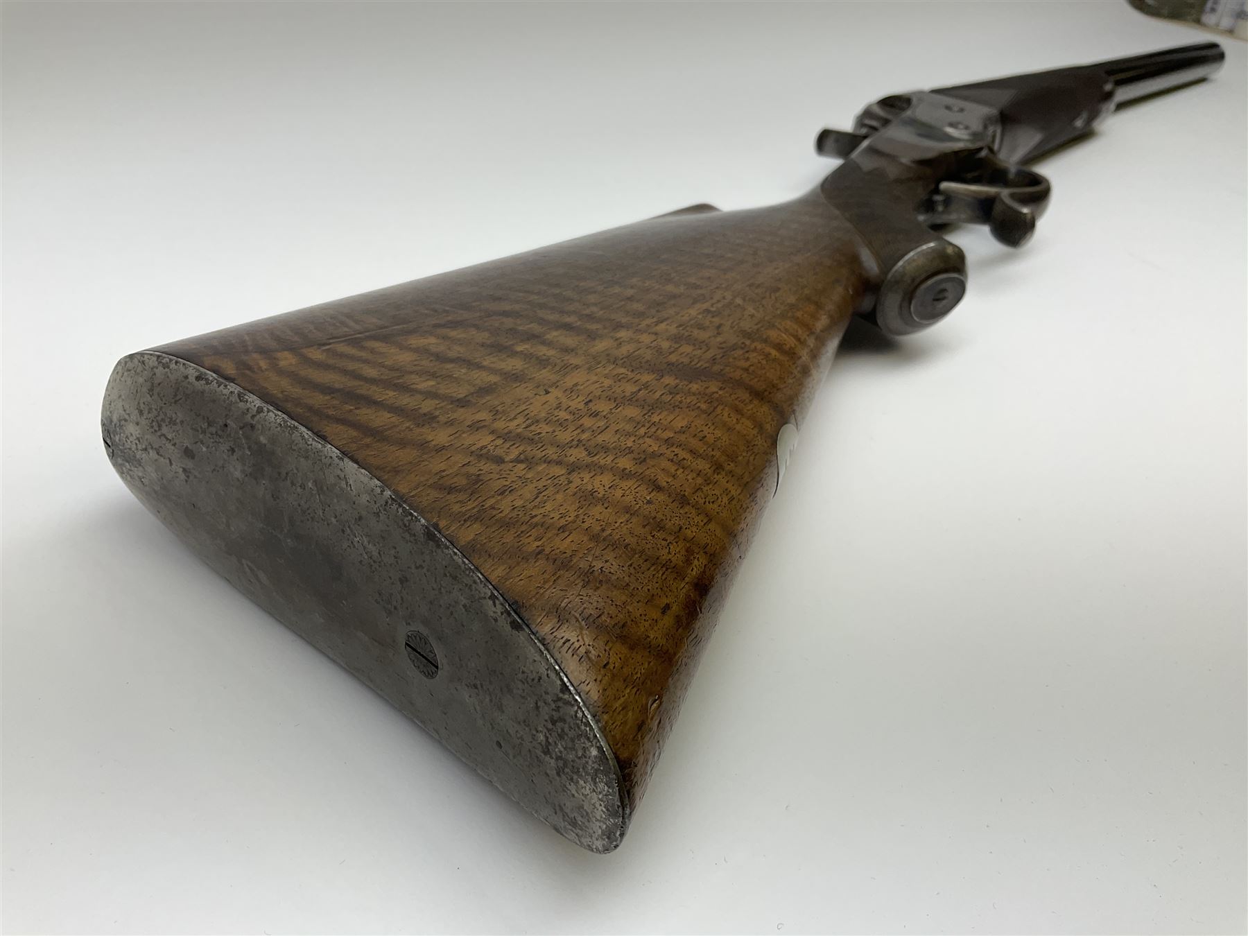 Rare Henry Pieper Liege seven-chambered solid barrel 297/30 calibre rim-fire volley gun with six barrels around a central seventh barrel drilled for simultaneous fire, built on a Remington type rolling block action, blued 62cm barrel with raised rib and twin rear leaf sights, case hardened action complete with loading plate for seven cartridges, walnut stock with chequered pistol grip and fore-end and inset 'silver' cartouche with two Chinese type characters, no.256PLN, L109cm overall