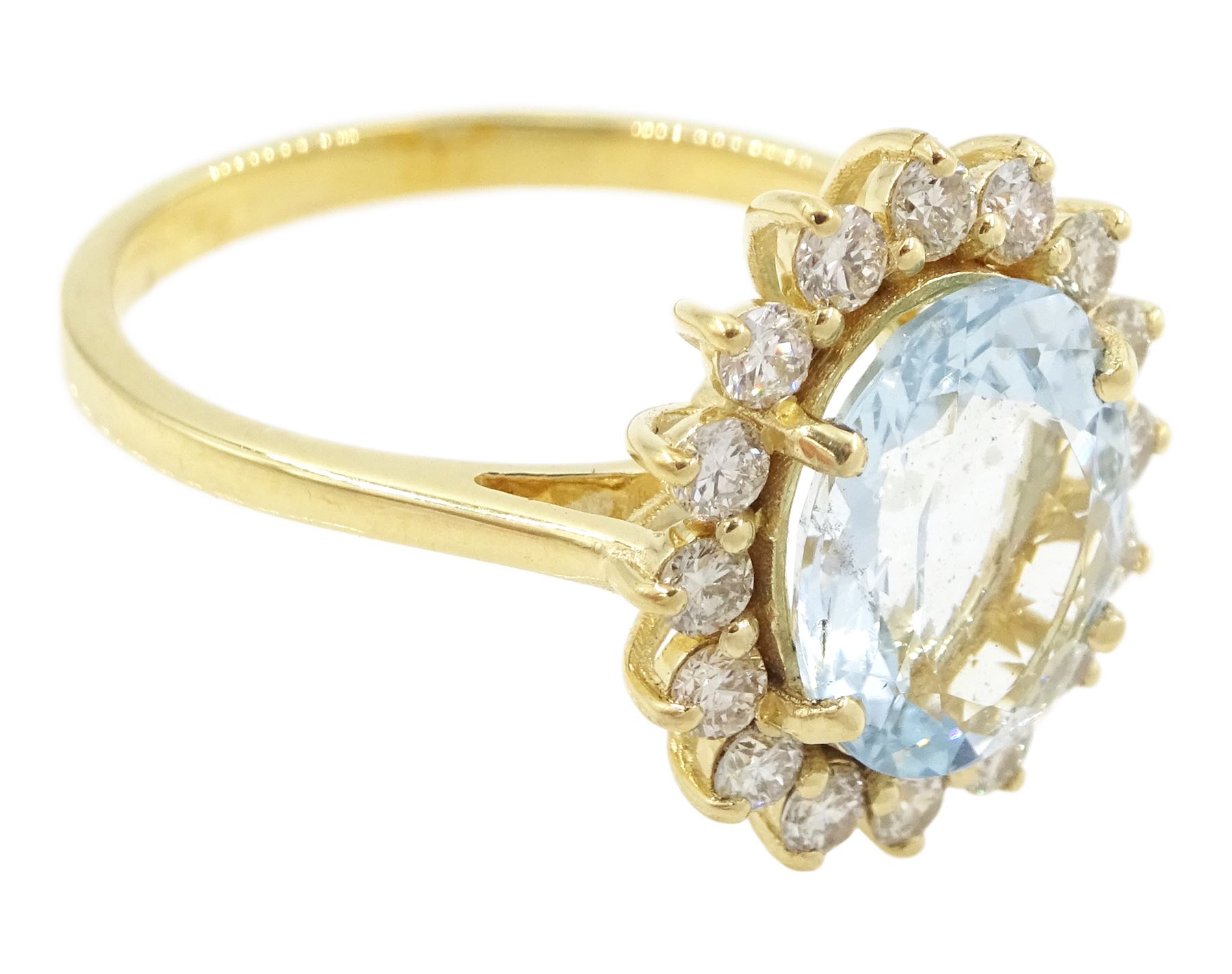 18ct gold oval cut aquamarine and round brilliant cut diamond cluster ring, stamped, aquamarine approx 1.90 carat, total diamond weight approx 0.50 carat