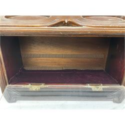 20th century Irish cigar shop display cabinet by Roger Aplin, Dublin, the box with hinged glazed front and decorative scroll top, H30.5cm