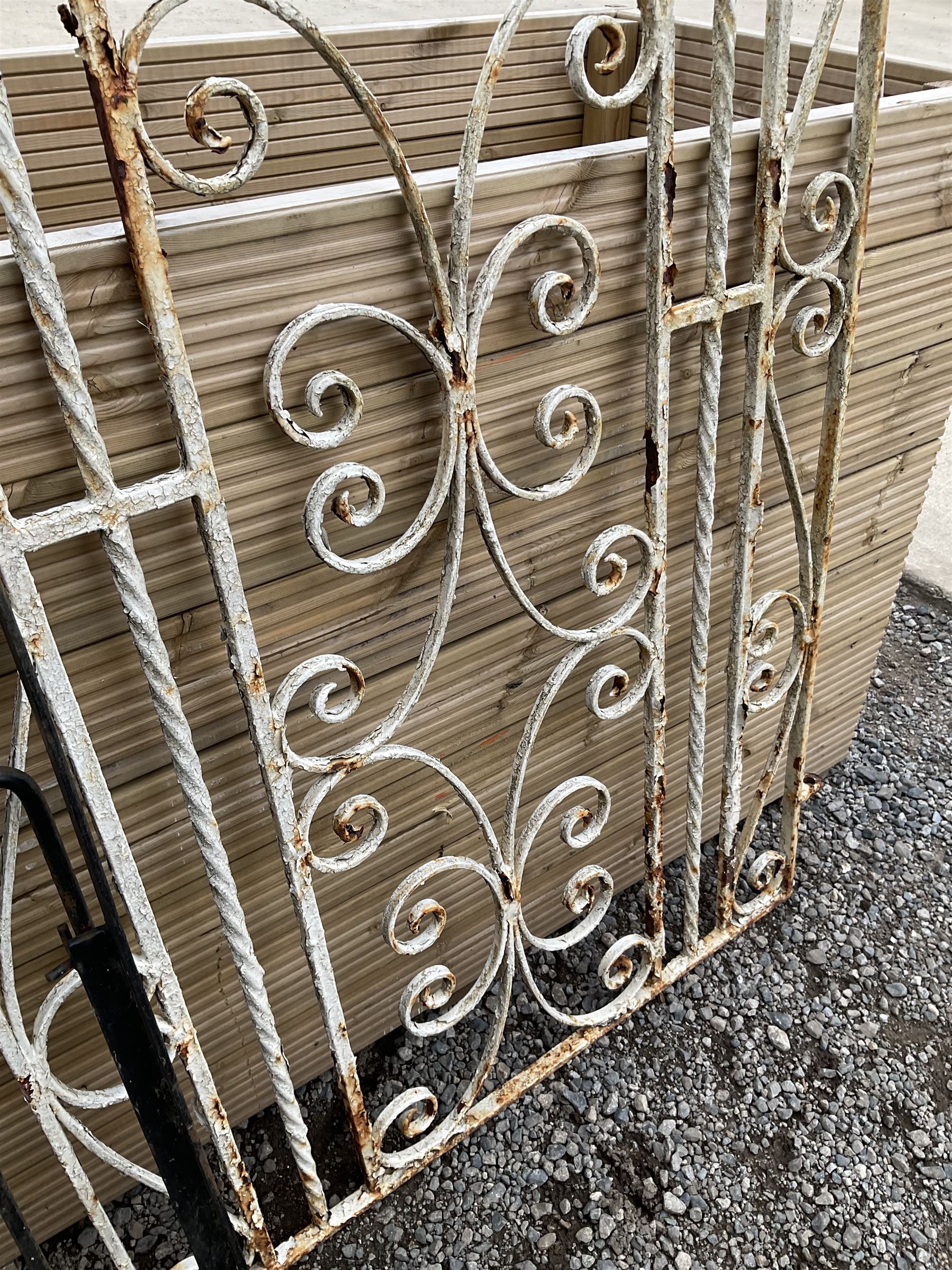 Two wrought iron garden gates painted in black and white - THIS LOT IS TO BE COLLECTED BY APPOINTMENT FROM DUGGLEBY STORAGE, GREAT HILL, EASTFIELD, SCARBOROUGH, YO11 3TX
