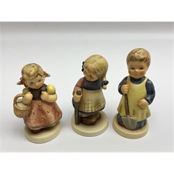 Twenty eight Hummel figures by Goebel, to include Mountaineer, Private Conversation, Kitty Kisses, Little Goat Herder etc  