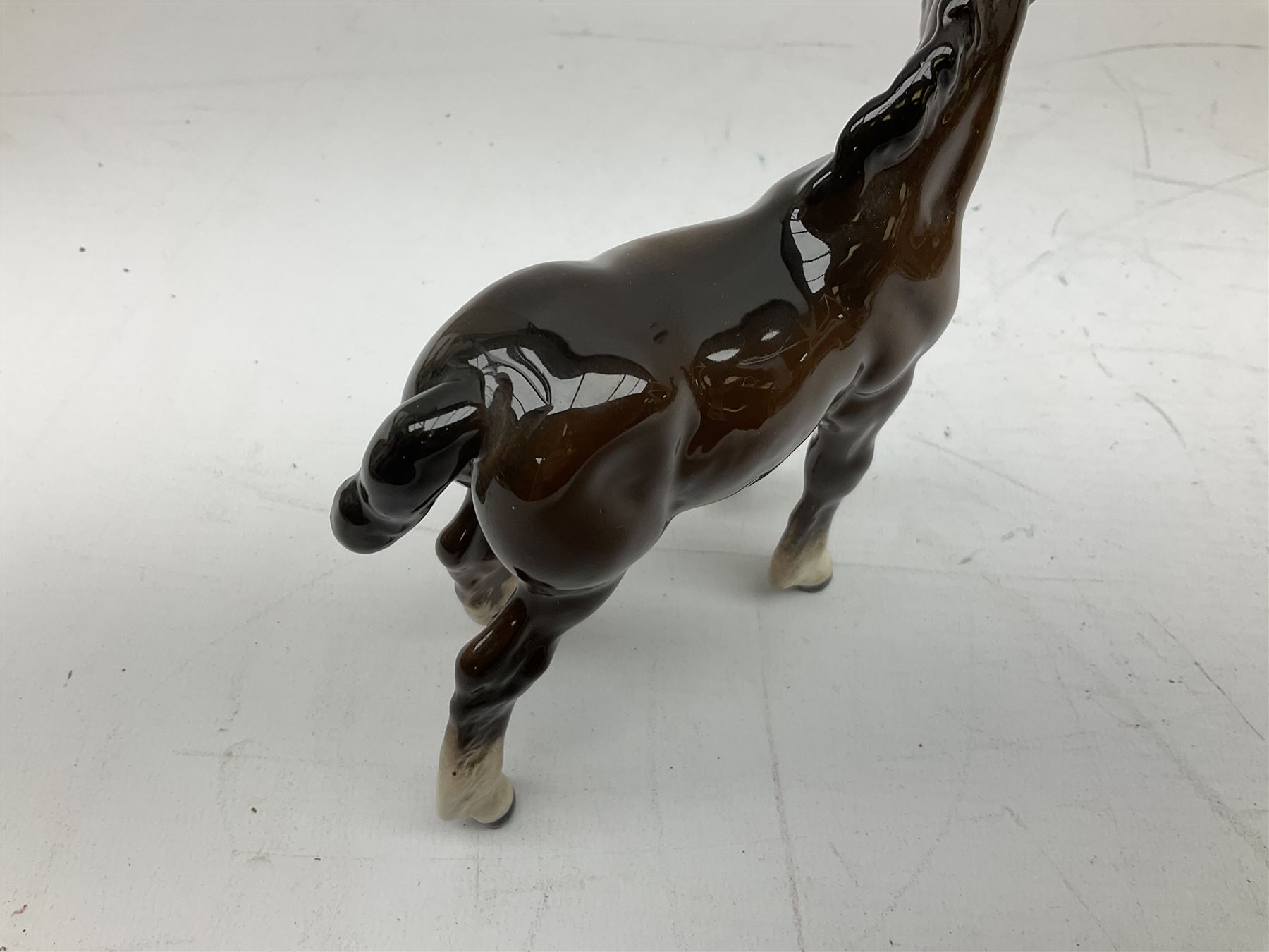 Seven Beswick figures of horses, including Connemara pony in grey no.1641, Arab in bay no.1265, large foal in grey no.947 etc, together with a Goebel figure of a horse (8)