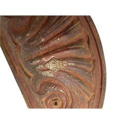 19th century cast iron hallway hat and coat stand, the arched frame decorated with overlapping foliage, central oval mirror surrounded by trailing oak leaves and acorns, with extending umbrella and stick stand, the curved plinth base decorated with acanthus leaves, with impressed and mounted R.d. lozenges