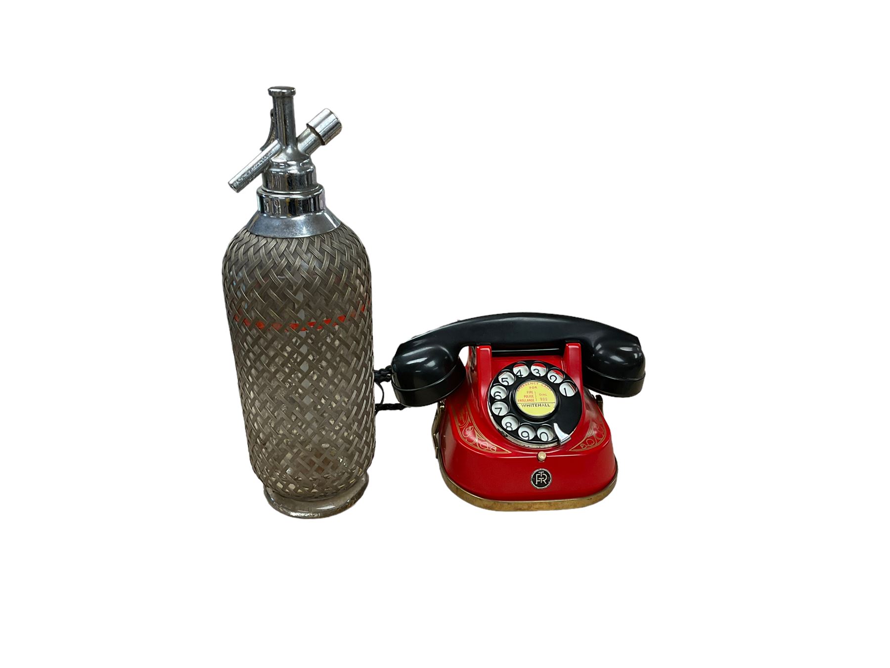 Glass soda siphon, together with Belgian Bell Telephone Company dial-up telephone, by MFG