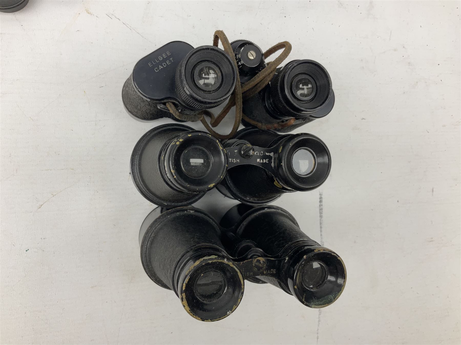 Nine binoculars to include Prinz 10x50, Prinzlux 10x50,  Ellgee Cadet 8x25, Mark Scheffel 35x50 etc, eight with cases