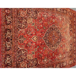  Persian Kashan red ground rug, floral and urn repeating border, central medallion, 295cm x 390cm  