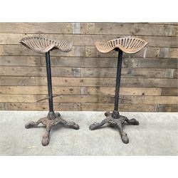 Pair of heavy cast iron tractor seat bar stools