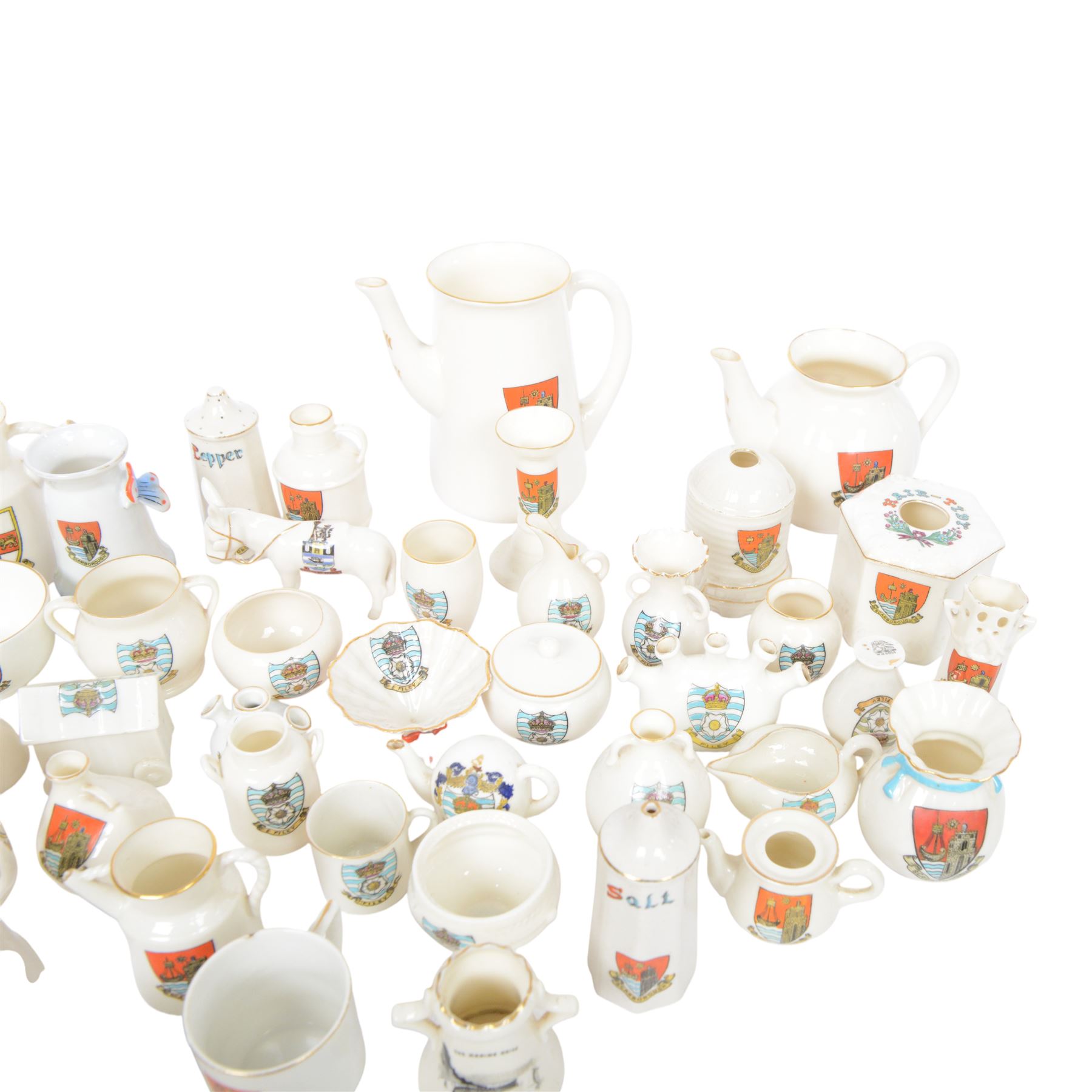 Large collection of Scarborough, Filey and Yorkshire Crested ware, including vases, teapots, jugs, bells etc