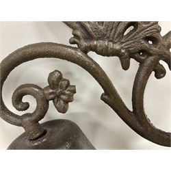 Cast iron exterior hanging garden bell with decorative butterfly bracket