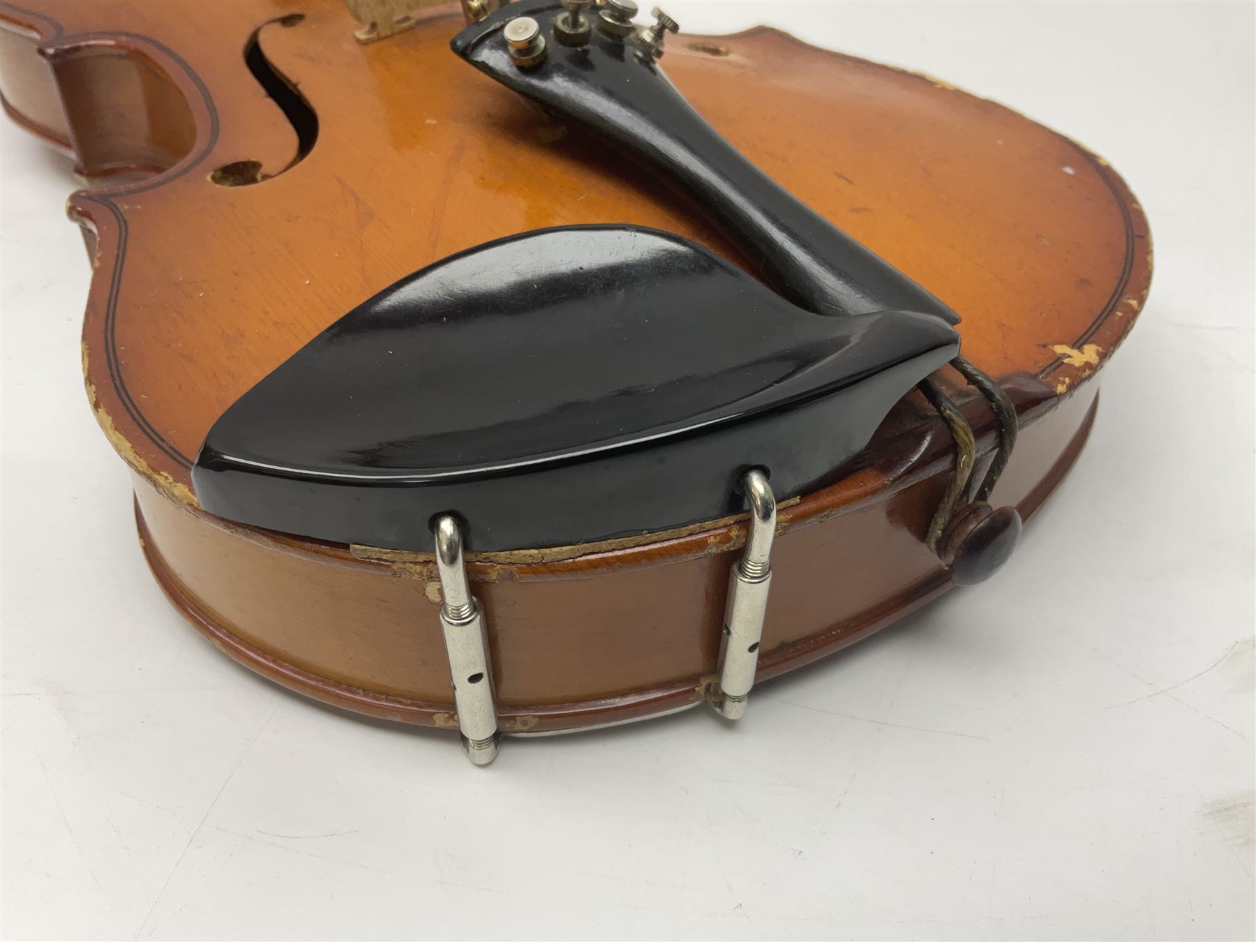 Four Chinese graduated violins - full size with 35.5cm two-piece back; three-quarter size with 33.5cm two-piece back; half size with 31cm two-piece back; and quarter size with 27.5cm two-piece back; all cased except full size; one with bow (4)