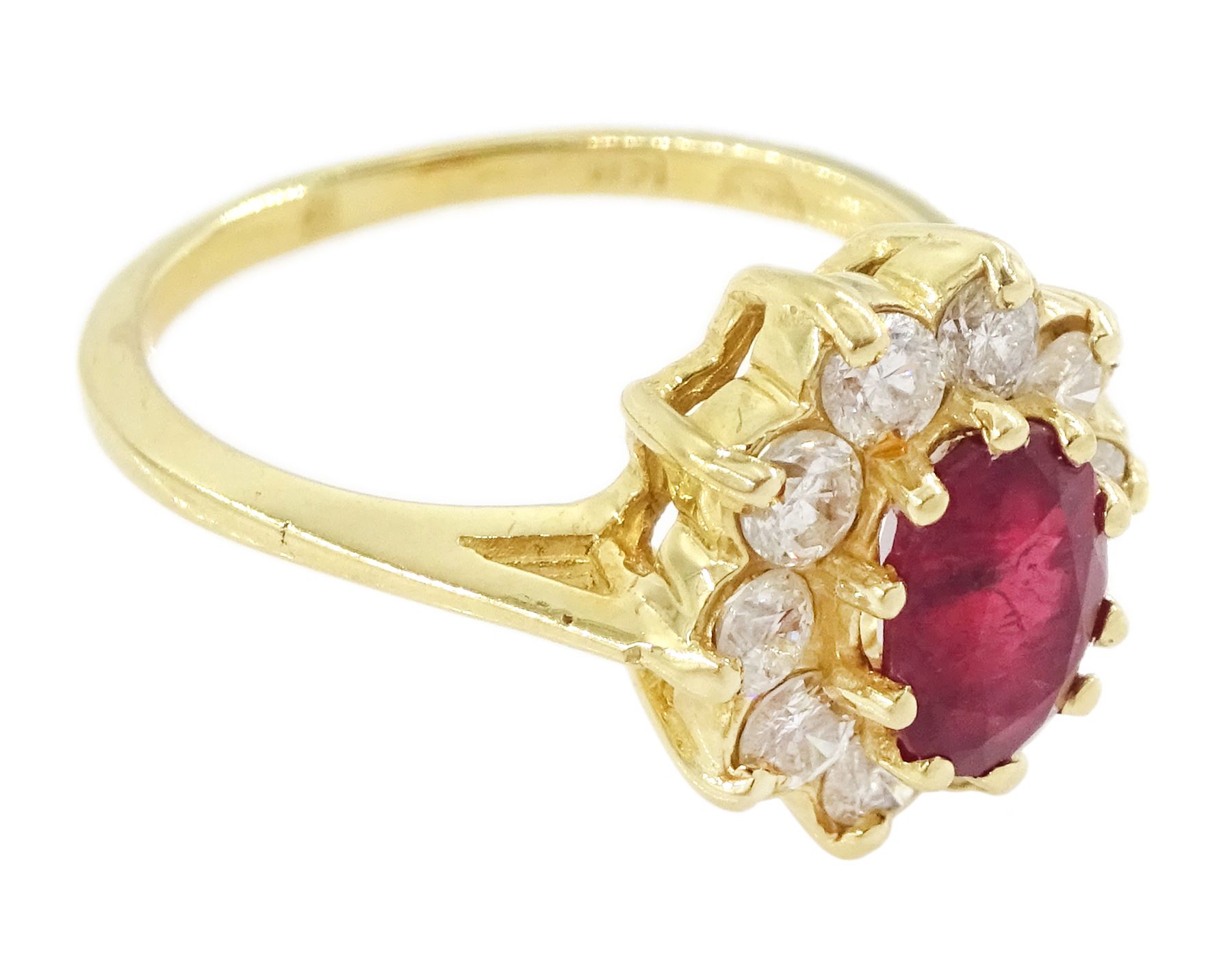 14ct gold oval cut ruby and round brilliant cut diamond cluster ring, stamped, ruby approx 0.90 carat, total diamond weight approx 0.50 carat