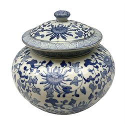 Chinese blue and white lidded jar, decorated with flowers and branches surrounded by key fret border, gilding etc, character mark beneath H24cm