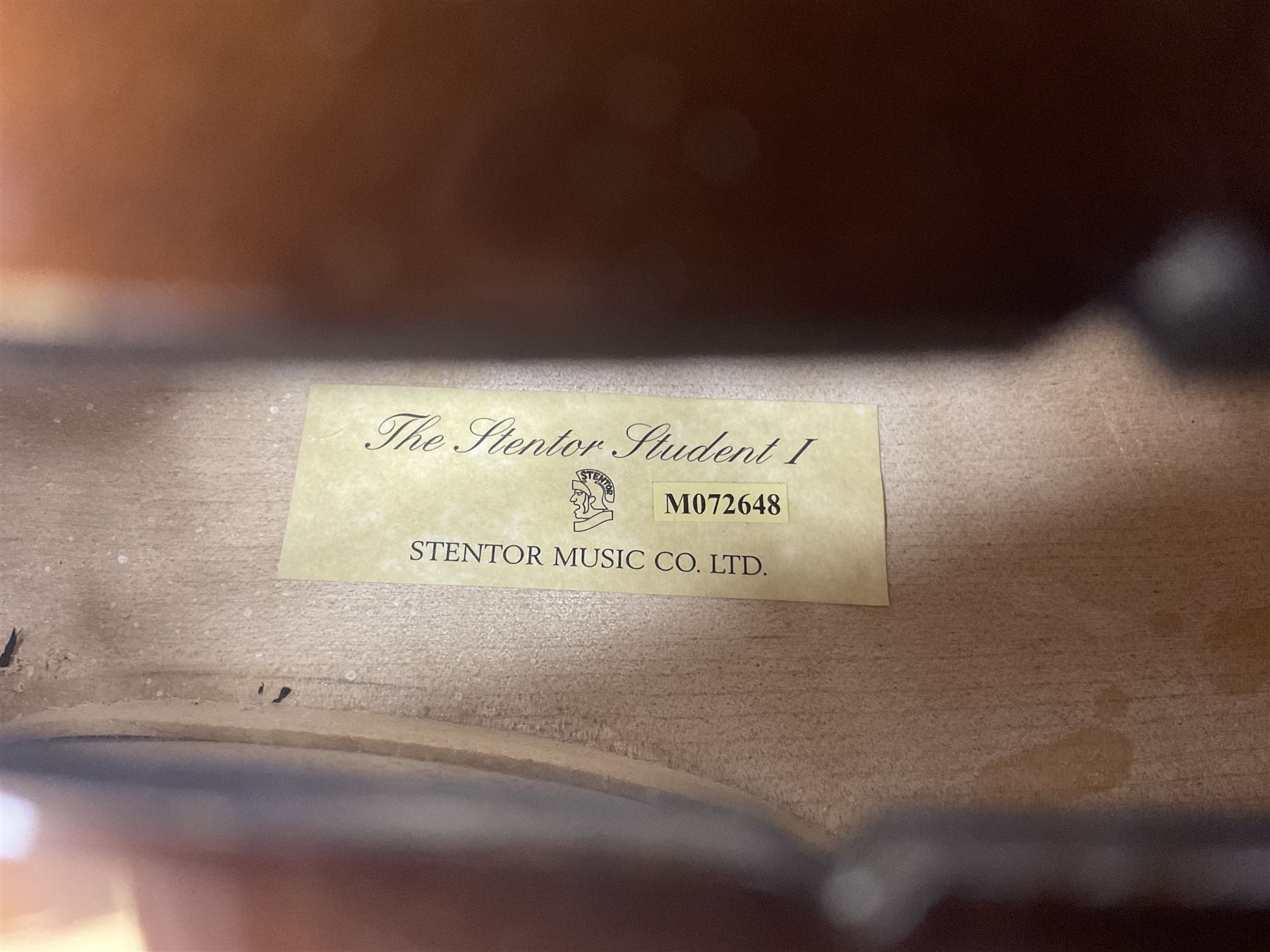 Stentor Student I quarter-size cello with 59.5cm two-piece maple back and ribs and spruce top; bears maker's label with serial no.M072648 L95.5cm overall; in Stentor soft carrying case with bow