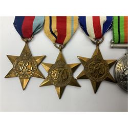 WWII group of five medals comprising 1939-45 War Medal, Defence Medal, 1939-45 Star, Africa Star and France and Germany Star on wearing bar; WWI British War Medal awarded to 142019 Pte. A. Thompson A.S.C.; and boxed King's Badge 'For Loyal Service'