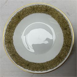 WW2 Nymphenburg cups and saucer, decorated with Imperial German Iron Cross encircled in a foliate boarder with gilt edging, with printed mark beneath 
