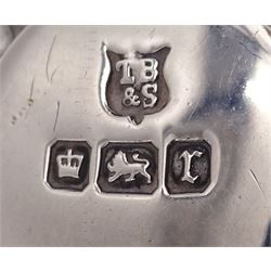 Edwardian silver caddy spoon, in the form of a jockeys cap, with embossed decoration and blank shield shaped cartouche, hallmarked Thomas Bradbury & Sons Ltd, Sheffield 1909, L5.3cm